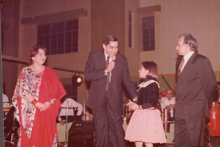 Various colored umbrellas drifting into the afternoon sky