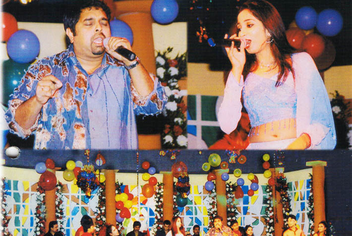 Various colored umbrellas drifting into the afternoon sky