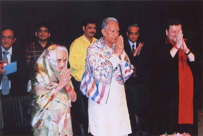 Various colored umbrellas drifting into the afternoon sky