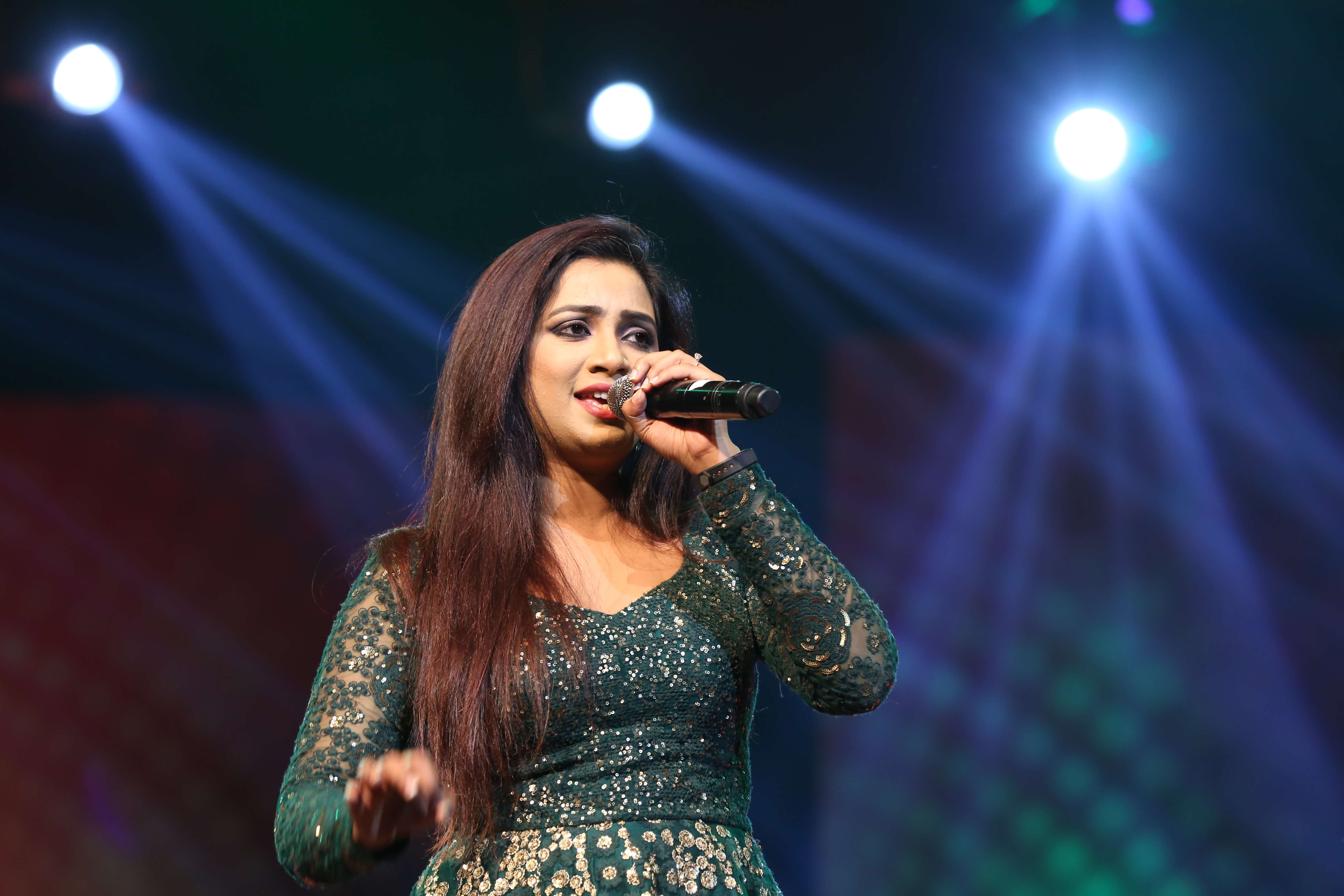 Various colored umbrellas drifting into the afternoon sky