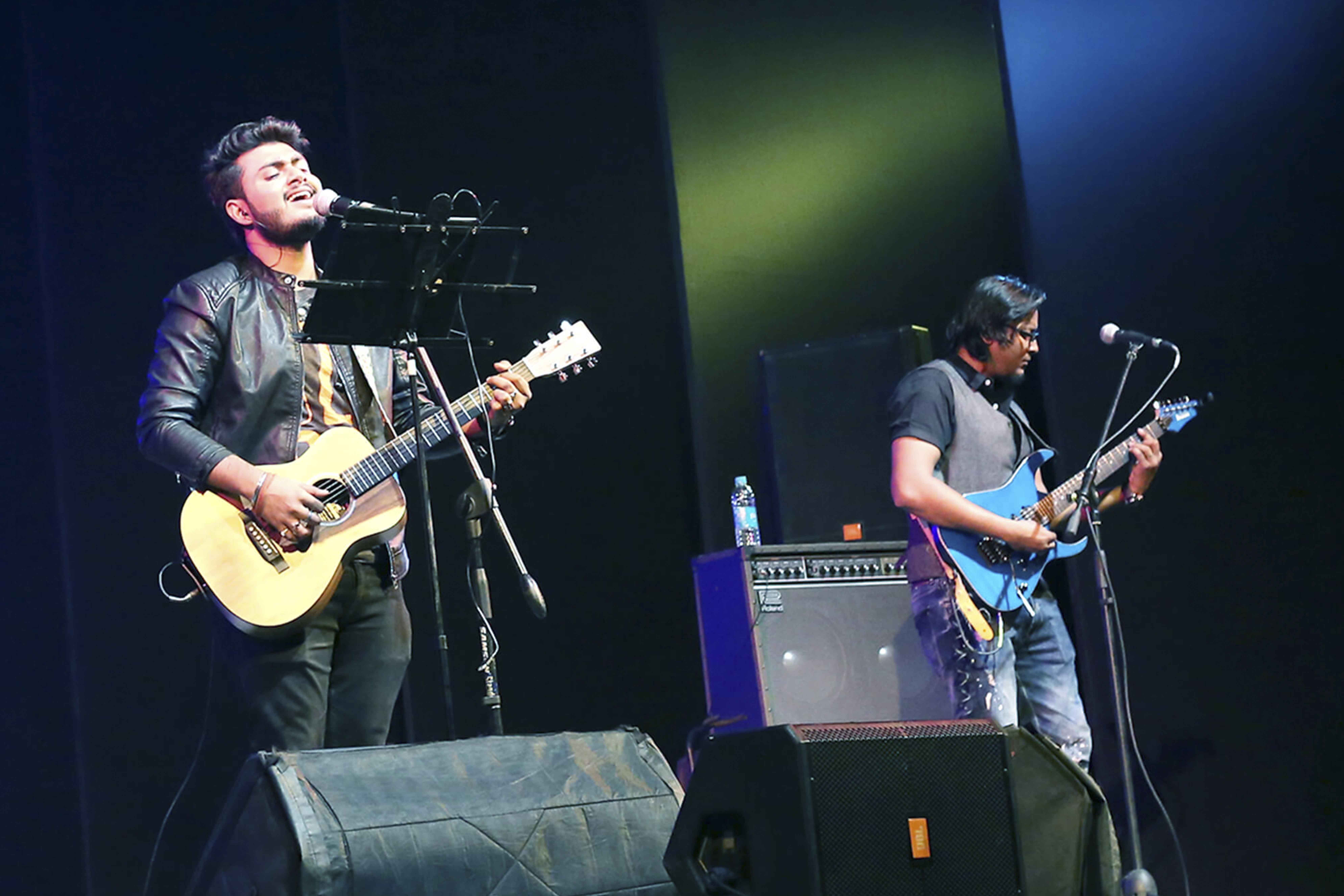 Various colored umbrellas drifting into the afternoon sky
