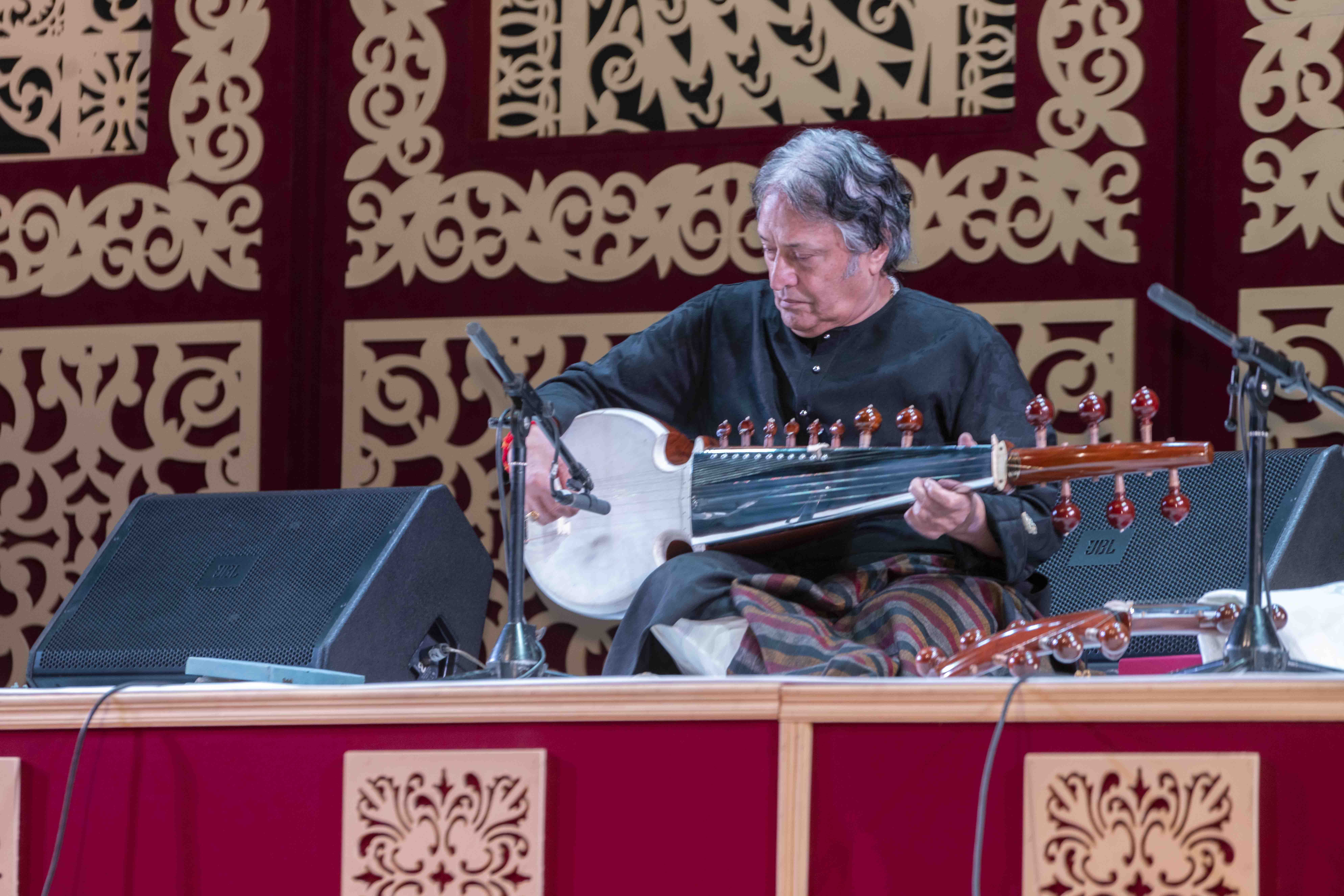 Various colored umbrellas drifting into the afternoon sky