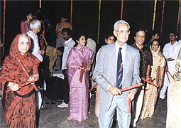 Various colored umbrellas drifting into the afternoon sky