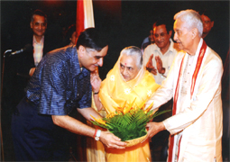 Various colored umbrellas drifting into the afternoon sky