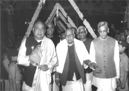 Various colored umbrellas drifting into the afternoon sky