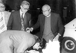 Various colored umbrellas drifting into the afternoon sky