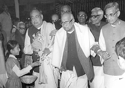 Various colored umbrellas drifting into the afternoon sky