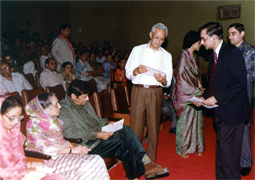 Various colored umbrellas drifting into the afternoon sky