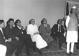 Various colored umbrellas drifting into the afternoon sky