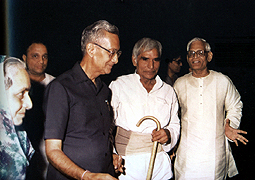 Various colored umbrellas drifting into the afternoon sky