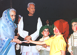 Various colored umbrellas drifting into the afternoon sky