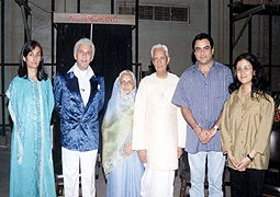 Various colored umbrellas drifting into the afternoon sky