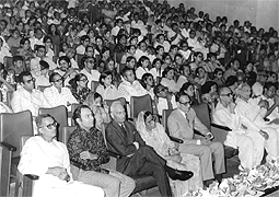 Various colored umbrellas drifting into the afternoon sky