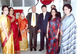 Various colored umbrellas drifting into the afternoon sky