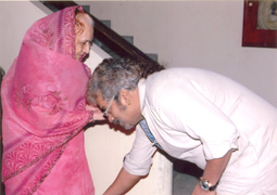 Various colored umbrellas drifting into the afternoon sky
