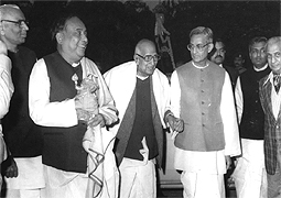Various colored umbrellas drifting into the afternoon sky
