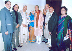 Various colored umbrellas drifting into the afternoon sky