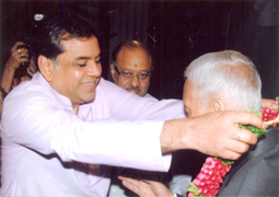 Various colored umbrellas drifting into the afternoon sky